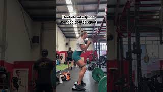 Heel elevated knee banded goblet squat