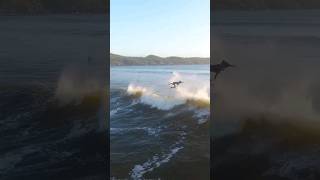 Surfer Catching Massive Air At Cox Bay, Tofino BC