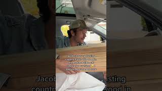 Jacob pulls up in an Audi with wood lol