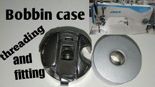 bobbin case threading and fitting in machine