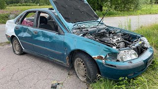 Abandoned Volvo S40 at an abandoned asylum accommodation