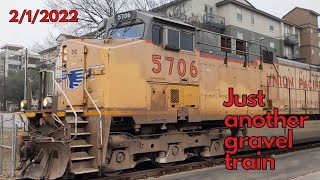 Union Pacific gravel train with crispy AC44 Passing Through ATX Amtrak Station