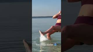 Jumping into ice cold Michigan lake water