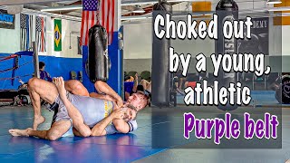 Brown belt choked out by a young, athletic purple belt