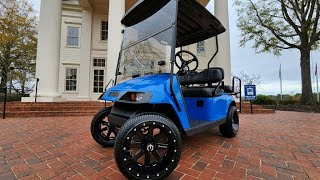 Painting a golf cart Porsche Blue and some help from my son.