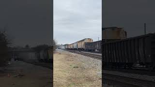 Ns 1835 leads mixed freight with freight car leaking cargo in Austell, Ga