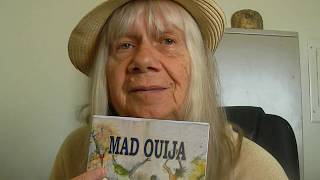 Sister Linda King fights electric shock in "Mad Ouija"