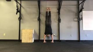 Wall Handstand With Shoulder Taps | StrongFirst