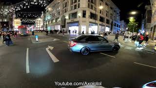 Noisy Mercedes does a close pass and u turn on London's Oxford street.