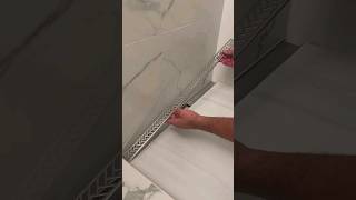 Finishing touches for Schluter vario drain. #shorts #shower #schlutersystems #bathroom #tile