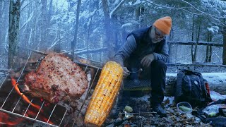 Pork chop on campfire. Winter hiking in the forest.