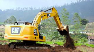 CAT 320GC Excavator Digging Turning The Dirt Over On Potatoes Farm Field