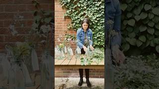 Fun diy table plan on wooden ladder with bottles & wild flowers. #weddingdecor #diyweddingdecor