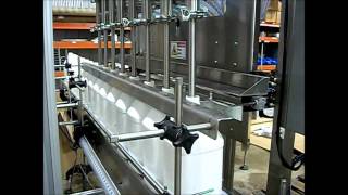 Automatic Gravity Filler with Diving Fill Heads | Liquid Filling Machine - APACKS