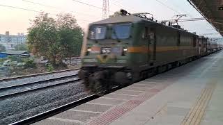 WAG9 hauling Bharat Petroleum BTPN tankers rushing past Sachin Station