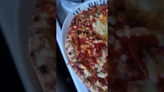 spicy meat feats pizza with extra cheese