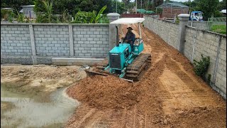 Skillful Dozer-D20P Operators are Building Roads a 3x20m And Clearing Sewer System Next to Road