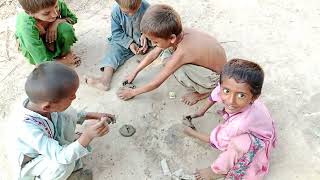 children playing game with each other عالم الطين وذكريات الطفولة والألعاب الطينية والأحلام