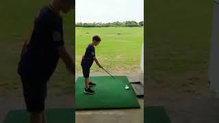 Golf practice at the driving range