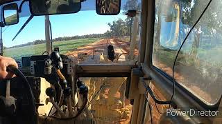 AUSTRALIA CAT  GRADER WORKING ON WATER CATCHMENT DRAINS.293