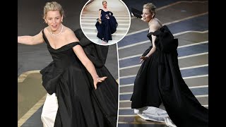 Elizabeth Banks ditches her shoes after almost tripping during Oscars