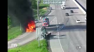 Semi-truck driver crashes into a broken down car at full speed on the highway.likely he will be fire