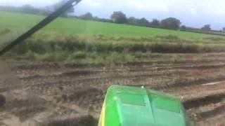 Subsoiling potato land with john deere 8345r and 3 leg simba, very wet land