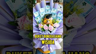 Buket boneka uang wisuda warna ungu