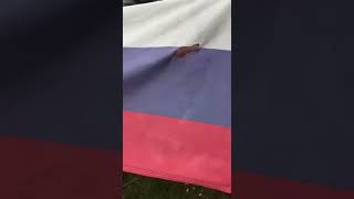 russian  flag being burnt