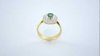 Anello in oro con smeraldo 0.66 ct e diamanti 0.38 ct