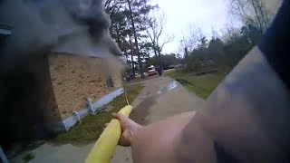 LiveLeak - Diboll police officer saves family dog from house fire