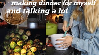 making a fancy vegan dinner while talking to a camera