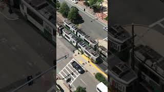 MBTA GL type 7 & 8 coupled train arriving at & departing from BU East station (B). 🚊🚉🟢