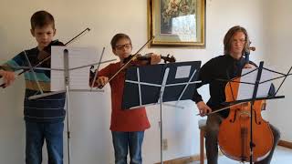 Jett strings trio playing a theme from Canon in D.