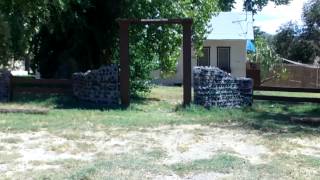 Bottle and Concrete Wall - China Ranch Date Farm