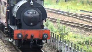 On hire J94, 68030 departing Aviemore on the Strathspey Railway.