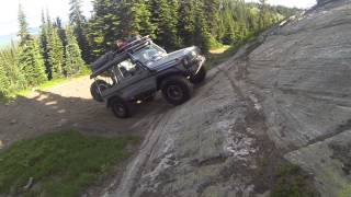 G wagon on steep rock