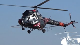 Spraying Mi-2 helicopter take off and landing