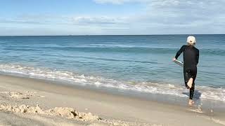 Skimboarding insane shorebreak