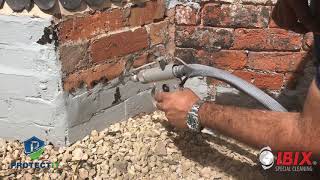 Removing paint and bitumen from brick