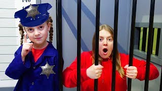 Ulya and mommy play police and toy jail playhouse