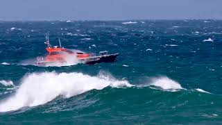 Two pilot launches at the heads during some choppy seas.