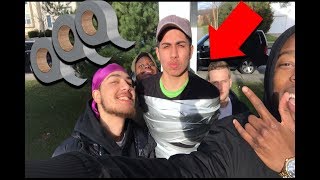 CRAZY DUCT TAPE CHALLENGE! (we left him there)