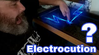 Your fish don't get electrocuted but you can. This is how and why.