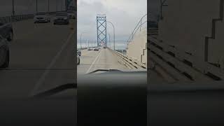 crossing back over the ambassador bridge into detroit from ontario