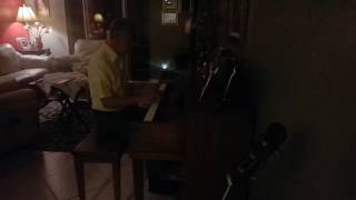 Dad playing Brucia La Tierra on piano