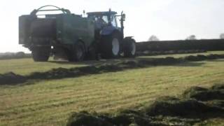 Silage 2011- New Holland bailing with a Mchale baler