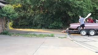 Loading the 1962 Buick Skylark Convertible onto the trailer. July 2019