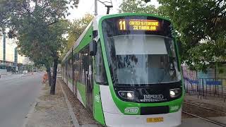 Tramvaiul Astra Imperio Metropolitan #3898 pe linia 11 sosind in statia Cartier Panduri