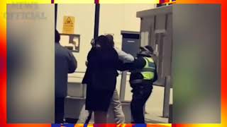 Moment drunk, handcuffed footy fan punches a policewoman